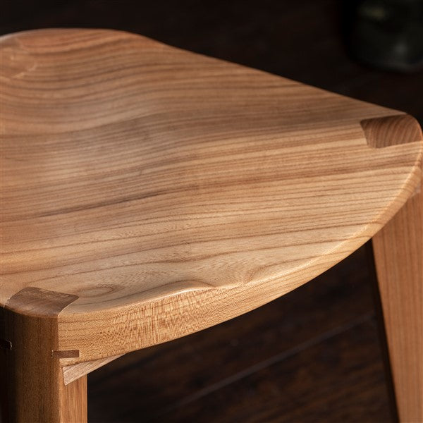 Elm wood three-legged stool carved seat
