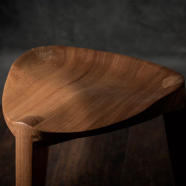 Elm wood three-legged stool carved seat